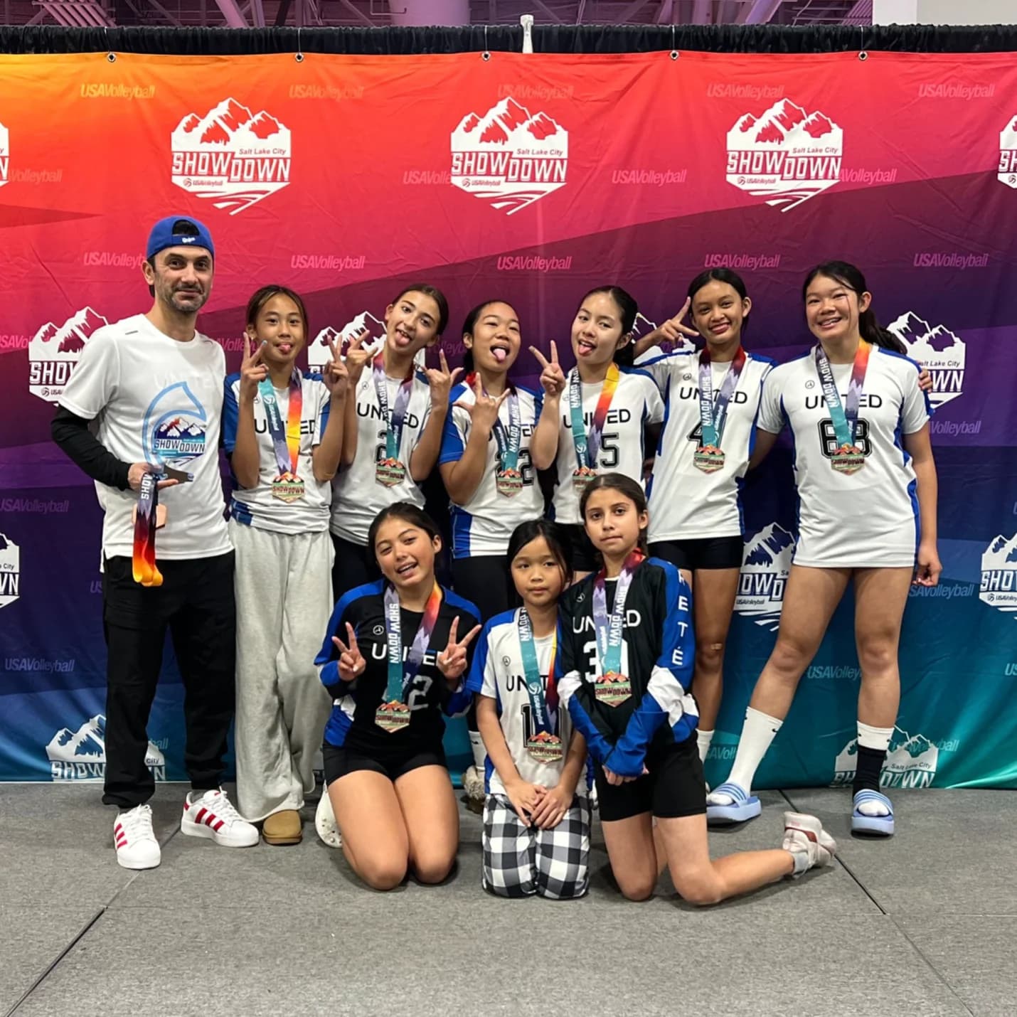 United SD team celebrating at the USA Volleyball Showdown tournament